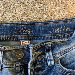 Silver distressed jeans. Size 28 x 32.